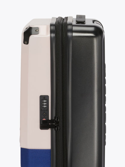 Tommy Hilfiger 21" Colorblock Hardcase Spinner Luggage